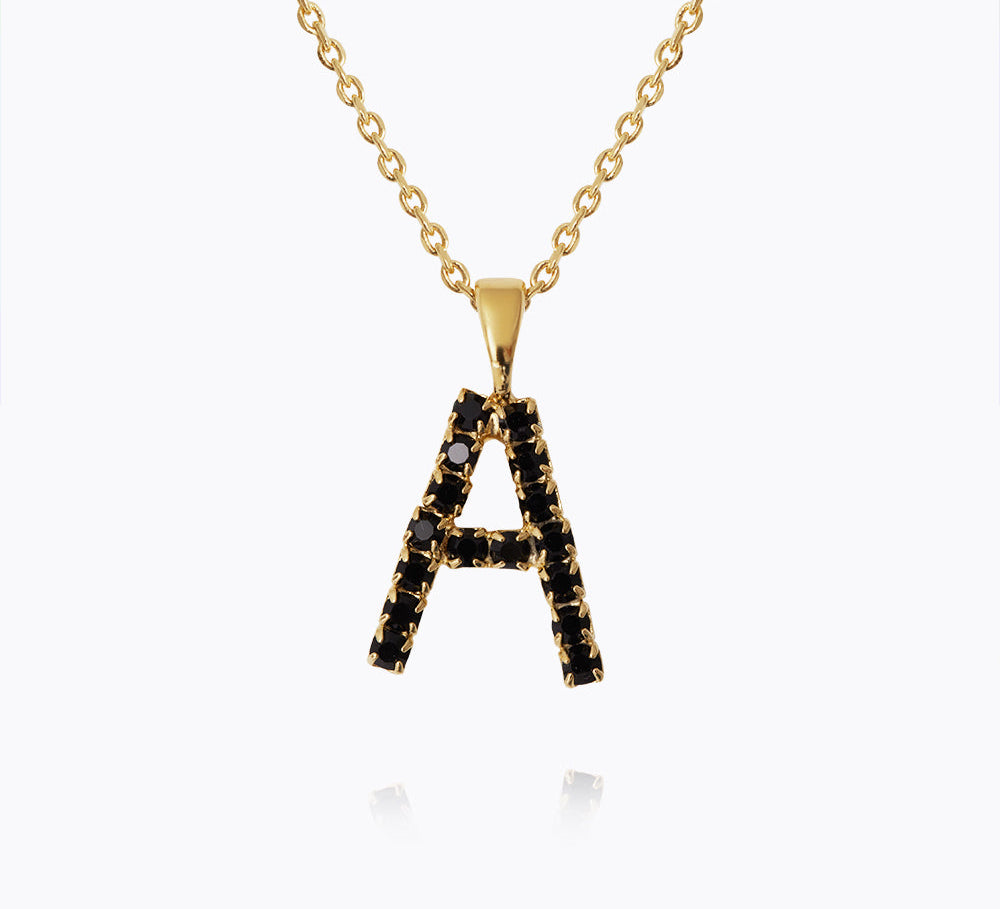 Caroline Svedbom - Mini Letter Black Necklace Letter A Gold
