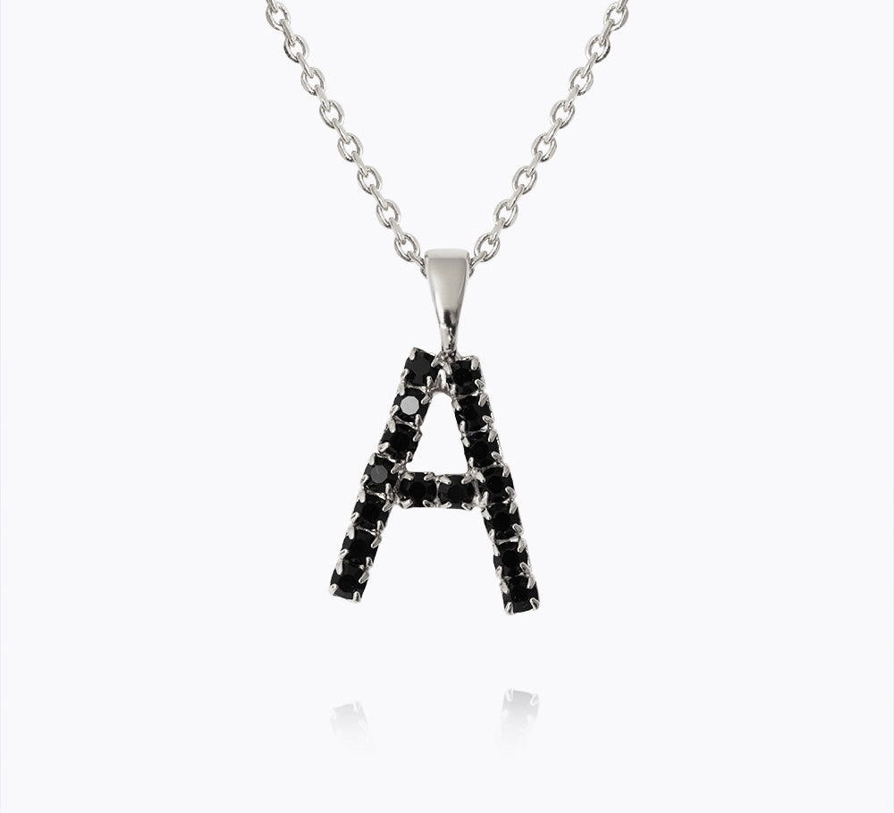 Caroline Svedbom - Mini Letter Black Necklace Letter A Rhodium