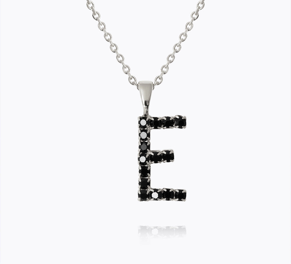 Caroline Svedbom - Mini Letter Black Necklace Letter E Rhodium