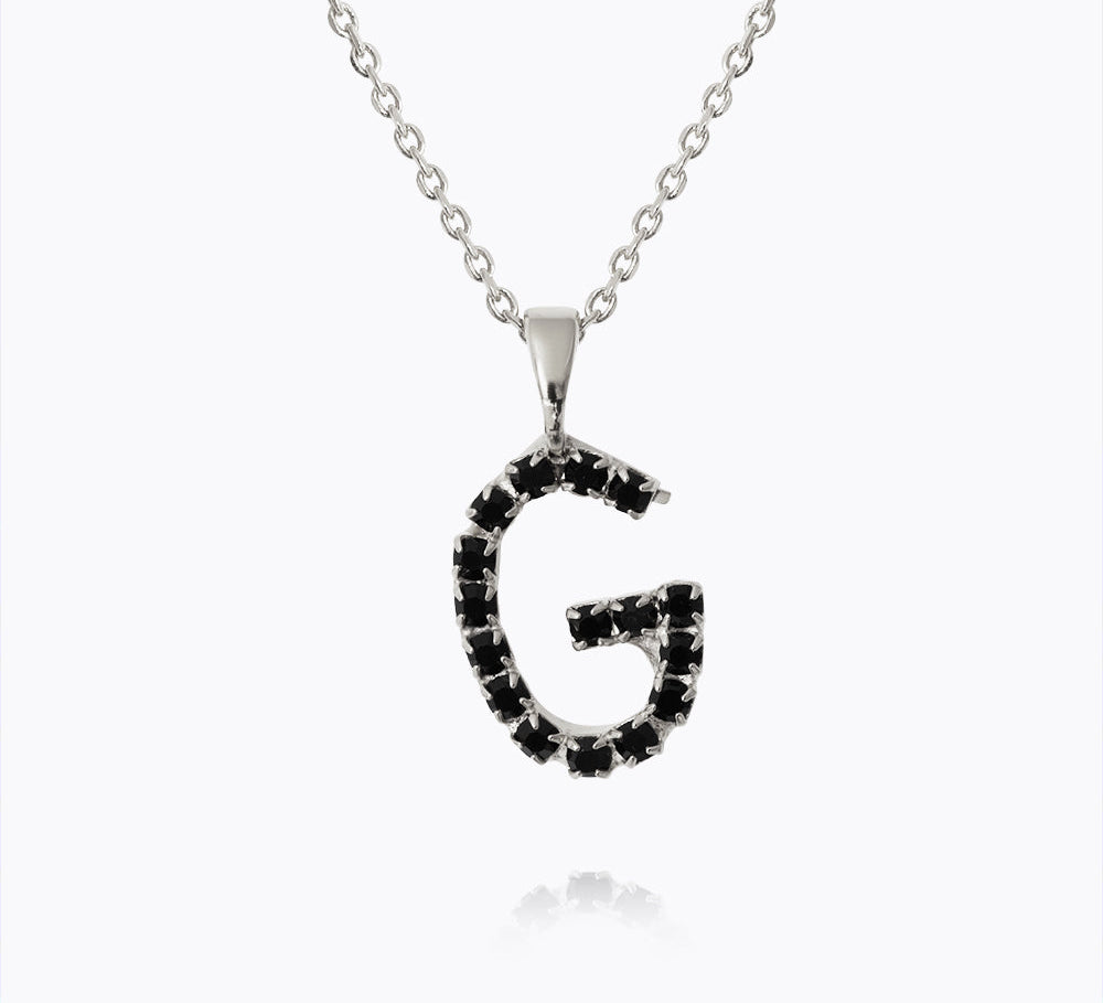 Caroline Svedbom - Mini Letter Black Necklace Letter G Rhodium