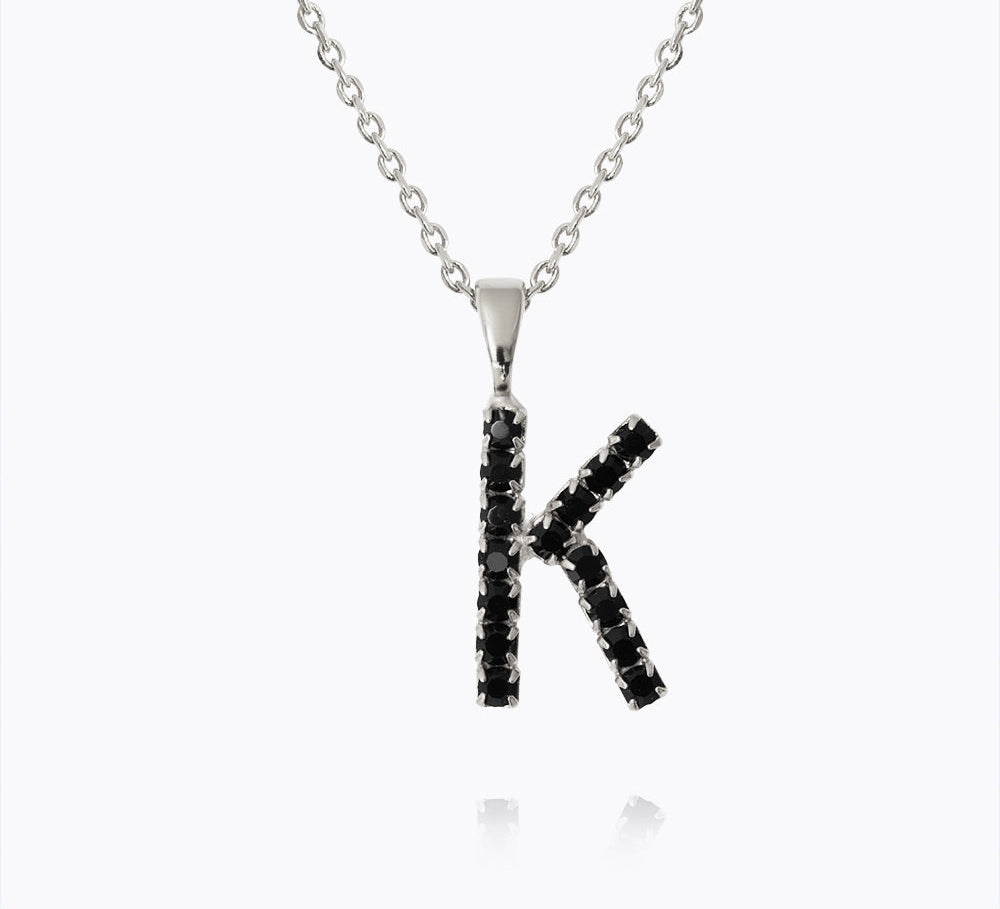 Caroline Svedbom - Mini Letter Black Necklace Letter K Rhodium