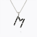 Caroline Svedbom - Mini Letter Black Necklace Letter M Rhodium