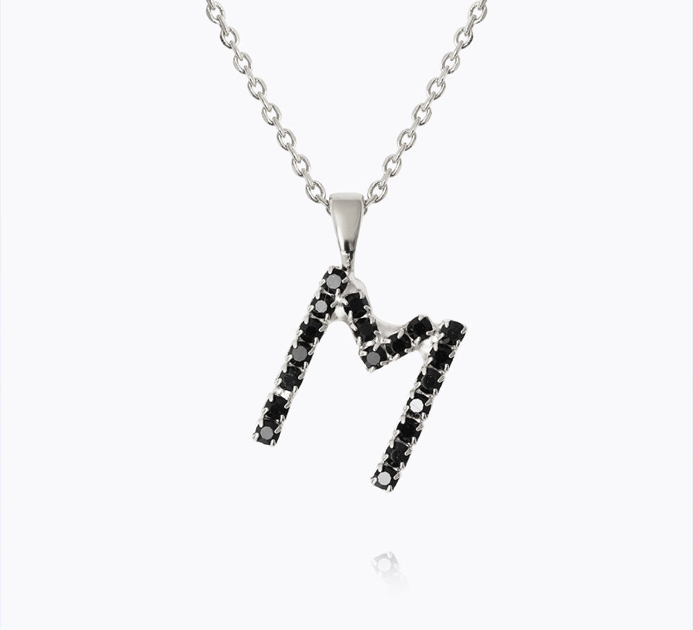 Caroline Svedbom - Mini Letter Black Necklace Letter M Rhodium