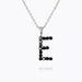 Caroline Svedbom - Mini Letter Black Necklace Letter E Rhodium